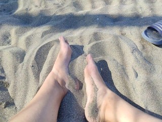 Chelsea K- Playing with my feets in the sand, look at my bare soles and playful fingers