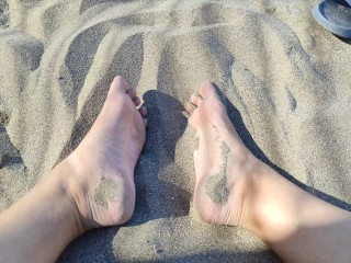 Chelsea K- Playing with my feets in the sand, look at my bare soles and playful fingers