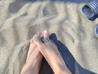 Chelsea K- Playing with my feets in the sand, look at my bare soles and playful fingers