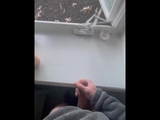 Jerking off in front of an open window