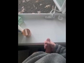 Jerking off in front of an open window