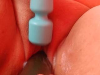 Wife takes cucumber while she rubs her clit with toy!