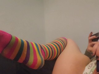 Adorable milf in rainbow socks got so horny watching porn had to fuck her pillow to cum 💦💦