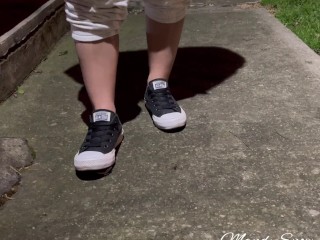 Crushing oreos in public with black converse chucks