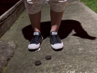 Crushing oreos in public with black converse chucks