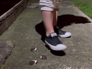 Crushing oreos in public with black converse chucks