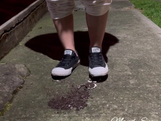 Crushing oreos in public with black converse chucks