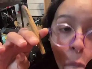 Teen black girl sucks me, while I roll a blunt