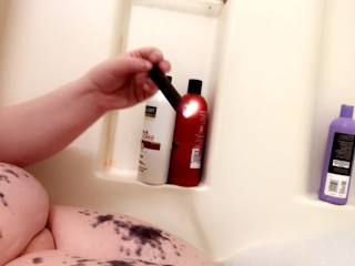 trans BBW drips wax on tits, thighs, and stomach in the bath