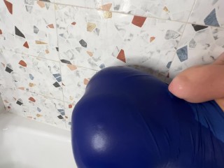 In the shower in a blue seductive dress, I get wet from this pleasant water and masturbate with a gl