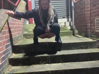 Pissing on a public staircase