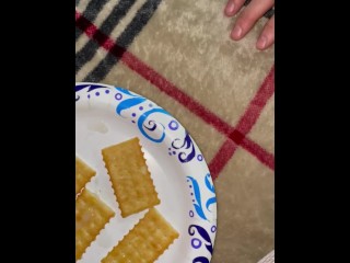 Chinese milf eats crackers with cum.