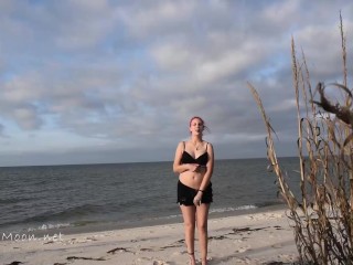 Showing off my naked body on the beach