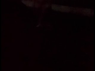 Standing naked at side of road trying to hide from cars