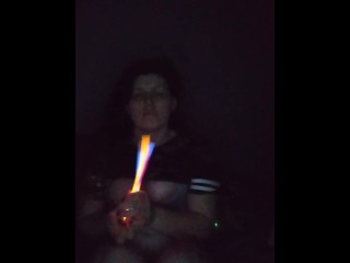 Fucking my mouth and pussy with glow sticks