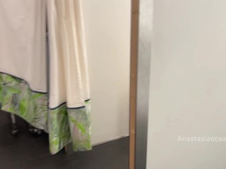 Pervert woman came to busy store. Public risky masturbation in fitting room.