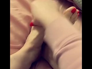 Lotioning freshly pedicured toes