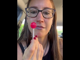 Pleasure Toy Queen masturbates in her car with her lollipop