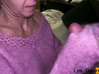 4K - Naked MILF with just a mohair wool sweater, jerks off a dick until she receives his cum on her