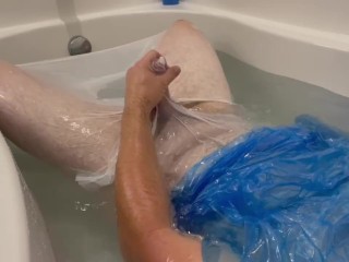 Plastic Bag Man taking a fun bath