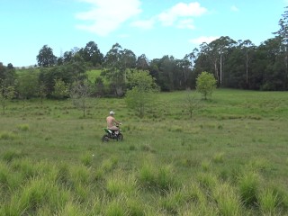 Naked man riding a Dirt bike