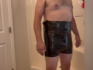 Plastic Bag Man Trying on Sexy Black Tight Pants