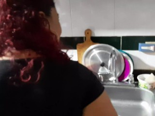 I interrupt the maid while she is washing the dishes so she can suck my dick