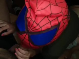 Spider woman in string gives her friend a good blowjob at a costume party 🔥🤤💦