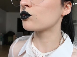 Putting on black lipstick for your pleasure by Domino Faye