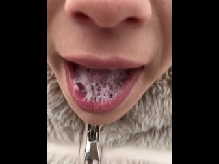 A nice teen drools a thick loogie from the tongue