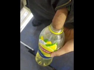 Filling a bottle with golden piss