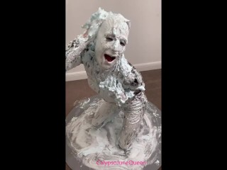 Milf in PVC Catsuit & heels covers her entire body with shaving foam pies