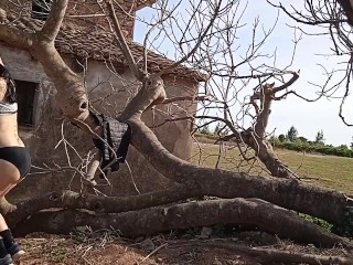 Training tit muscles in tree watched by snoopy man