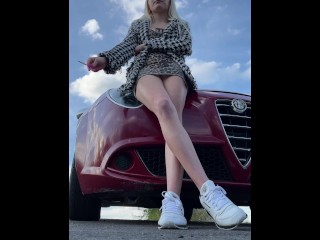 A nice blondie teen is smoking and spitting aggressively POV