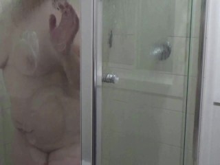 He surprises me in the shower, before fucking me doggy & unloading all over my face