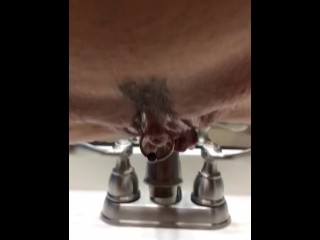 swinginmilf uses a sink to drain her sweet pussy of piss