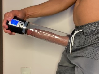 hot endowed man has reached the maximum size of his dick that no longer fits in his cock pump