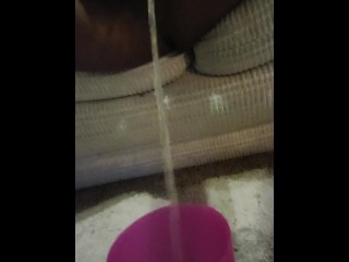 Black dick pissing in cup