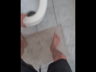 Big and hard cock of a young guy gives out a golden shower in the morning