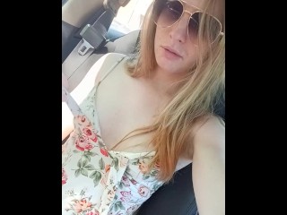 Teasing my pussy under my dress in the parking lot