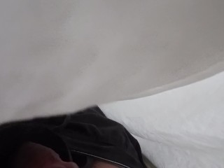 Touching self under sheets
