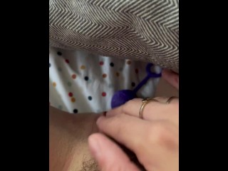 Inserting toy in hairy pussy