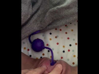 Pushing out toys from hairy pussy
