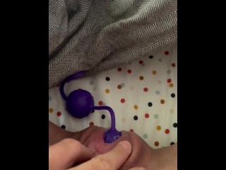 Pushing out toys from hairy pussy