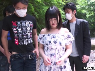 Japanese brunette Tsuna Kimura blows dick outdoors with a group of men uncensored.