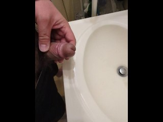 Hairy bear pisses and cums in sink.  Close up, HD