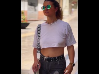 Walking the city Braless in an Underboob top.