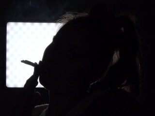 Shadow play while I light a cigarette. Alternative video, by long blonde hair girl