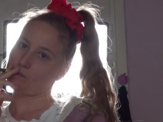 Shadow play while I light a cigarette. Alternative video, by long blonde hair girl
