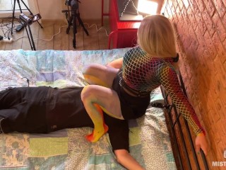 Mistress sitting and bouncing with her big nylon ass on slave face